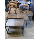 A set of four Victorian oak balloon back dining chairs and an oak trolley Unfortunately we are not