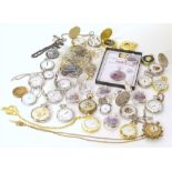 Thirty-one assorted costume pocket watches of base metal composition, including seven silver