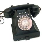 A vintage telephone Unfortunately we are not doing condition reports on this sale.
