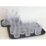 Whitefriars clear glass ships decanter, together with thirteen tumblers, all in bark effect, also