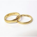 Two 22ct yellow gold rings 8.1g Unfortunately we are not doing condition reports on this sale.