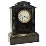Victorian black and veined marble 8-day mantel clock complete with pendulum and key. Unfortunately