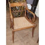 A Regency carver chair with split cane seat and rope twist back rail Condition reports are not