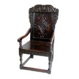 17th century design Wainscot chair, constructed from timber of various ages, cresting rail carved