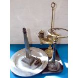 Three table lamps, one hammered pewter, one of oil lamp shape, also two pewter dishes Condition