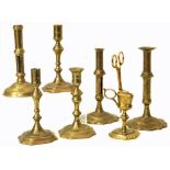 Two pairs of brass candlesticks Condition reports cannot be done for our Interiors sales.