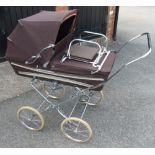Brown Silver Cross style pram complete with extra seat Condition reports cannot be done for our