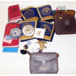 A collection of Masonic items to include armbands, apron, books and insignia Condition reports