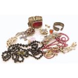 An assortment of costume jewellery including three Celtic style costume brooches by "Miracle", 3-row