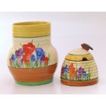 Clarice Cliff crocus pattern honey preserve pot and a vase Condition reports are not available for