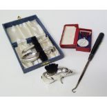 Silver pen brush in the form of a pig, coronation medal, plated christening set and boot pull