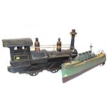 Wooden toy of American locomotive with metal wheels and a tin plate painted destroyer. Condition