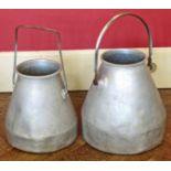 Two alloy milk units. Condition reports are not available for this sale.