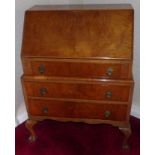 Early 20th century walnut bureau. Condition reports are not available for this sale.