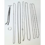 Assorted silver chains and a silver ring and a silver spoon Condition reports are not available