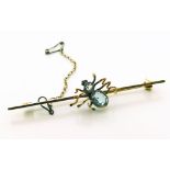 Edwardian 9ct gold spider bar brooch , width approx. 64mm, comprising two blue stones measuring