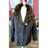 A dark brown mink fur short coat Condition reports are not available for this sale.