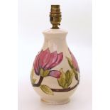 Moorcroft magnolia pattern table lamp. Condition reports are not available for this sale.