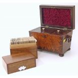 Victorian rosewood veneered tea caddy and a playing card case. Condition reports are not available