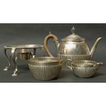 Three piece half fluted silver tea set with silver spirit stand with burner. Condition reports are