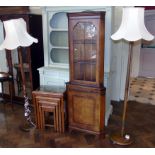 Floor standing walnut display cabinet, two standard lamps and a nest of four tables Condition