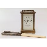 Matthew Norman carriage clock and an ivory glove stretcher with silver handles. Condition reports