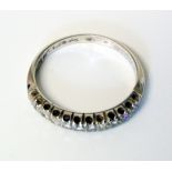 A diamond half eternity white gold ring Condition reports are not available for this sale.