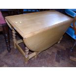 Early 20th century light oak miniature gate-leg barley-twist table, 85 x 113cm. Condition reports