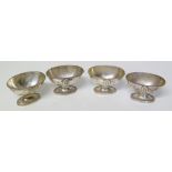 Four white metal oval shaped salts with catalogue decoration Condition reports are not available for