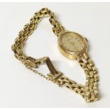 Ladies 9ct gold watch by Marvin Condition reports are not available for this sale.