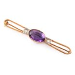 Amethyst and diamond 14ct gold bar brooch , central faceted oval amethyst measuring approx. 10mm x