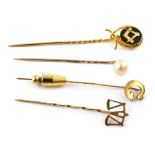 Set of four yellow gold stick pins , including one of Masonic interest, comprising polish bloodstone