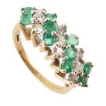 Emerald and diamond 3-row boat shaped cluster ring , comprising a total of 10 round cut emeralds