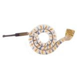 Pratt ware coil snake pipe circa 1800 , painted with blue and ocre glazes, 23cm wide For a condition