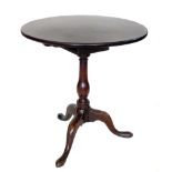 George III mahogany wine table, single piece circular top supported on birdcage block, baluster