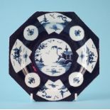 Bow octagonal plate circa 1760 painted with oriental landscapes within a powder blue ground, 17.