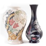 Two Moorcroft vases, decorated with Golden Lily on ivory pattern and Snakeshead pattern after Rachel