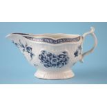 Worcester strap fluted sauce boat circa 1770, painted with flower sprays, crescent mark to base,