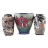 Moorcroft vase and two Cobridge vases, decorated with Clematis, Scallops and Orange Blossum