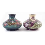 Two Moorcroft Vases, decorated with Carousel pattern after Rachel Bishop, numbered 804, and Borage