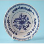 Bow patty pan circa 1760, painted with flora in under glaze blue, 11.5cm diameter For a condition
