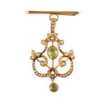 Edwardian 9ct gold peridot and seed pearl pendant brooch , central oval peridot measuring approx.