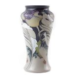 Moorcroft Trial vase, decorated with stylised flowers on a pale green grey ground, dated 10.12.14 to