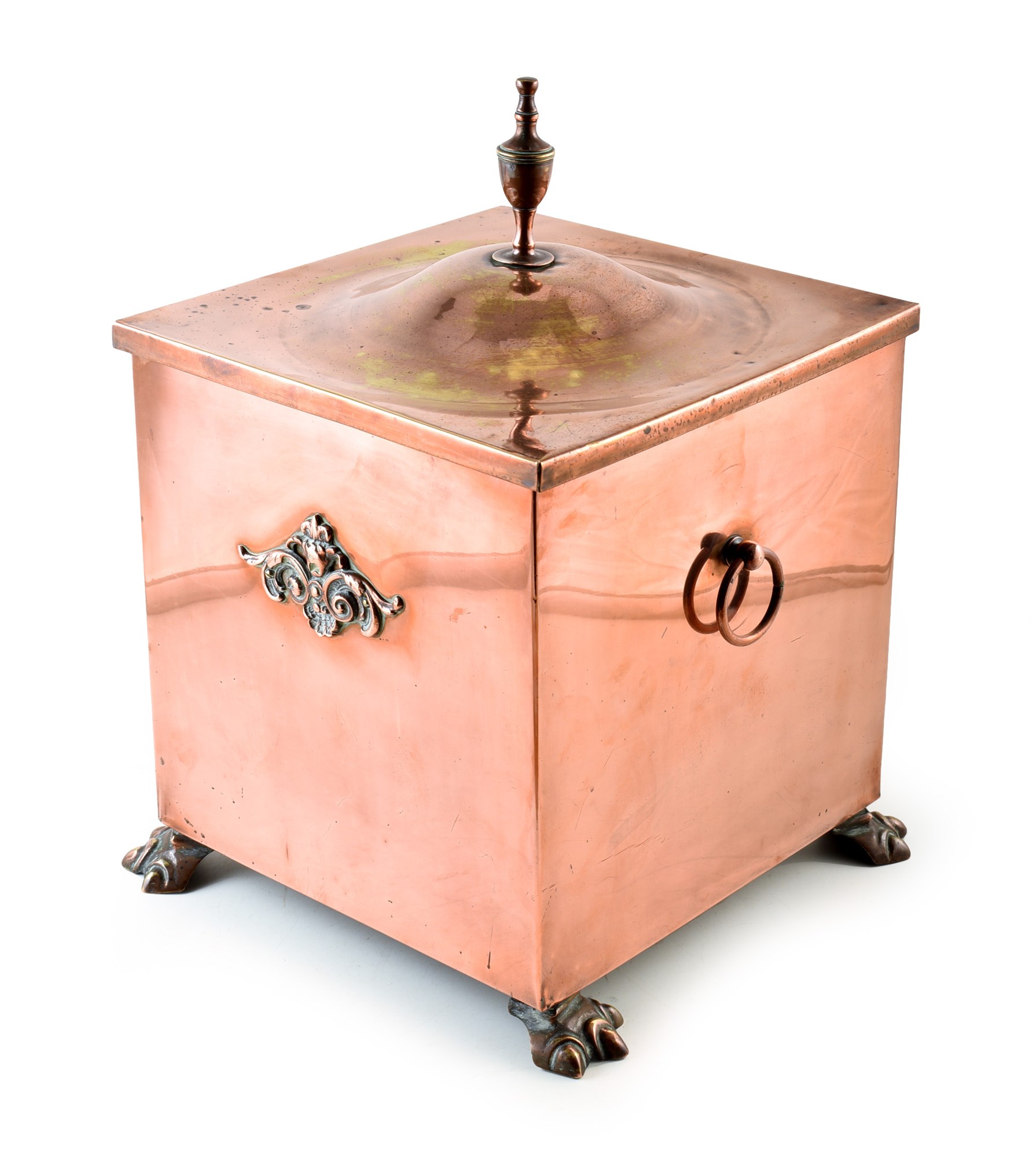 An Edwardian copper coal scuttle. With vase finial, acanthus branch embellishment and ring