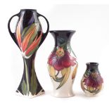 Three Moorcroft vases , two decorated with Anna Lily pattern, after Nicola Slaney, another with