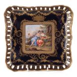 Vienna type dish, of square section with pierced blue and gilt border painted with a titled scene of