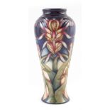 Moorcroft Lizard Orchid vase, after Philip Gibson, numbered 122 to base, 20cm high For a condition