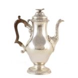 George III silver coffee pot , plain polished baluster form on circular spreading foot with