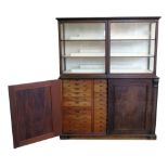 Victorian mahogany collectors cabinet, top section with double glazed doors covering painted stepped