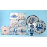 Group of Delft ware, to include five blue and white tiles and two others decorated in manganese, two